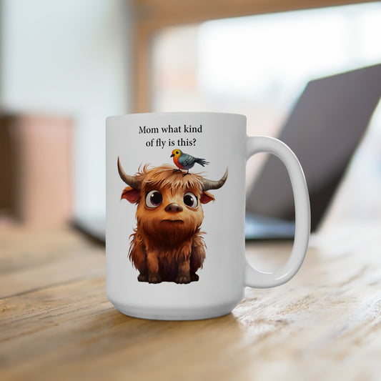 Baby cow with a bird mug