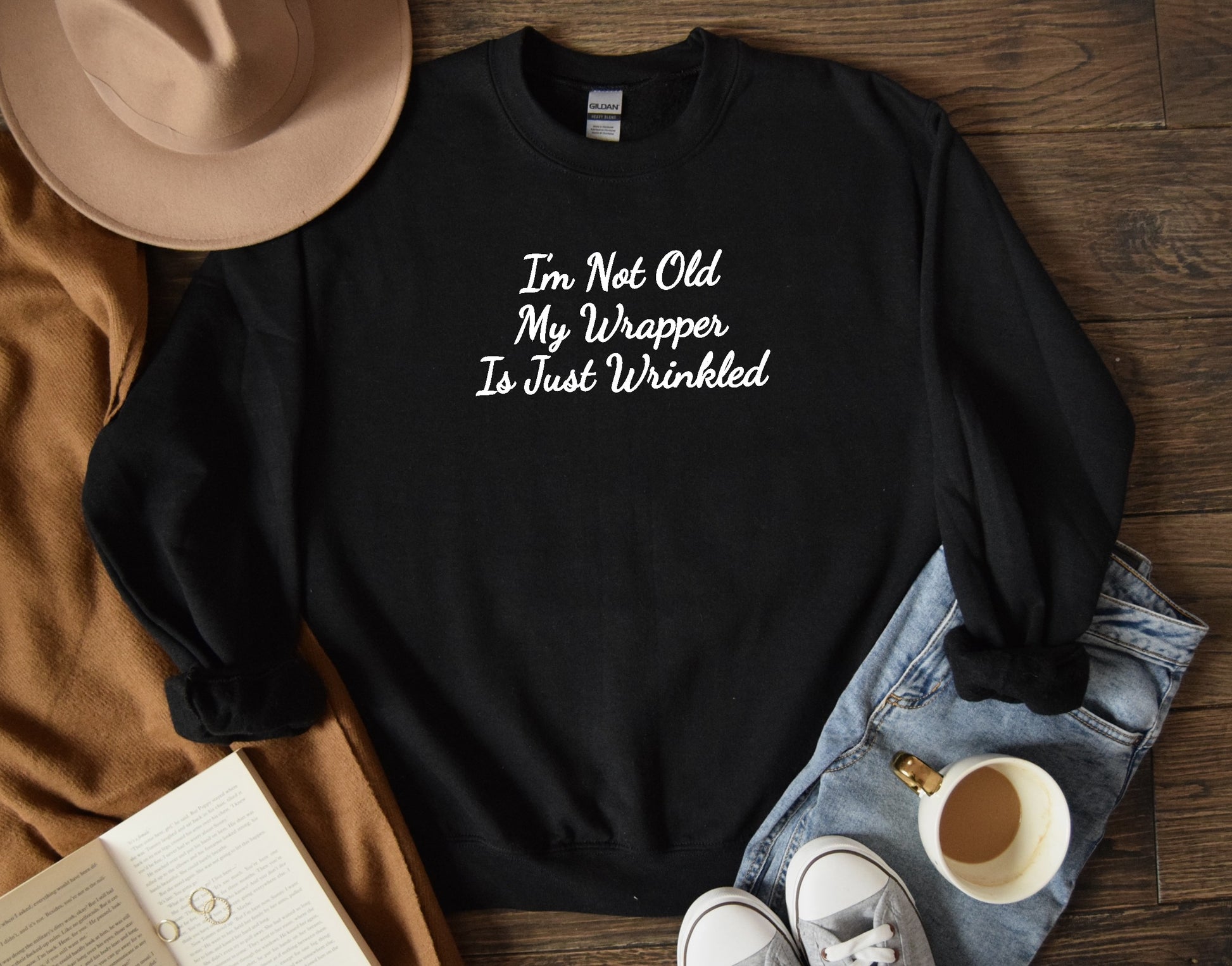 black gildan sweatshirt with graphic saying I'm not old my wrapper is just wrinkled