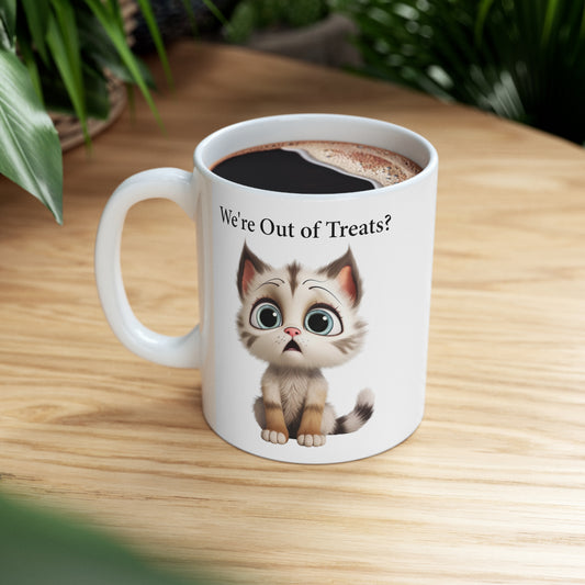 coffee mug with kitten sad that he is out of treats