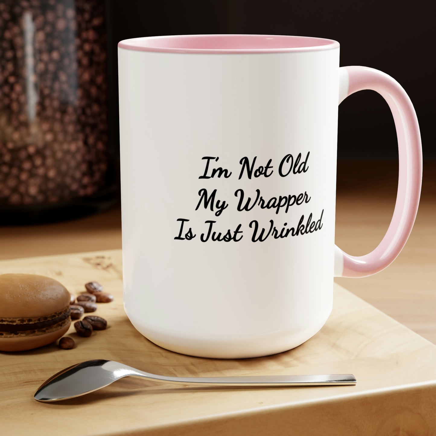 pink accent coffee mug saying I'm not old my wrapper is just wrinkled