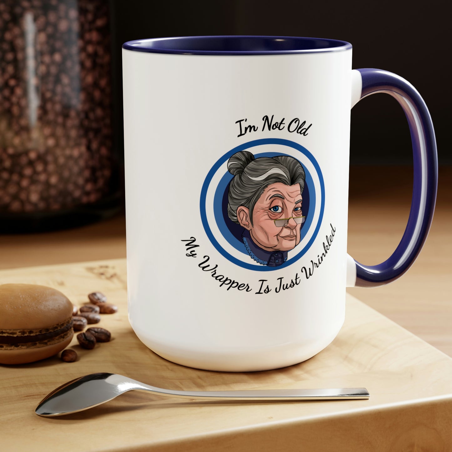 dark blue accent coffee mug with old lady picture saying I'm not old my wrapper is just wrinkled