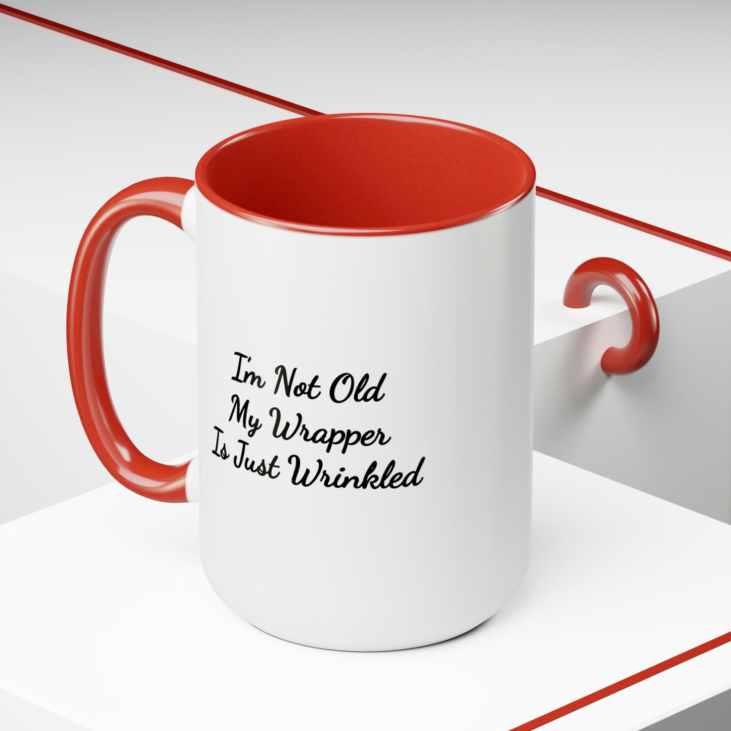 red accent coffee mug saying I'm not old my wrapper is just wrinkled