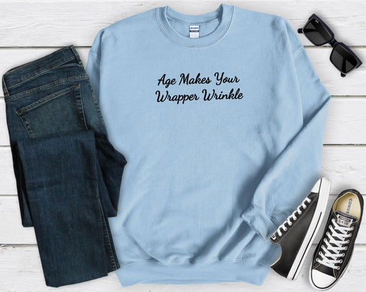 blue gildan sweatshirt saying age makes your wrapper wrinkle