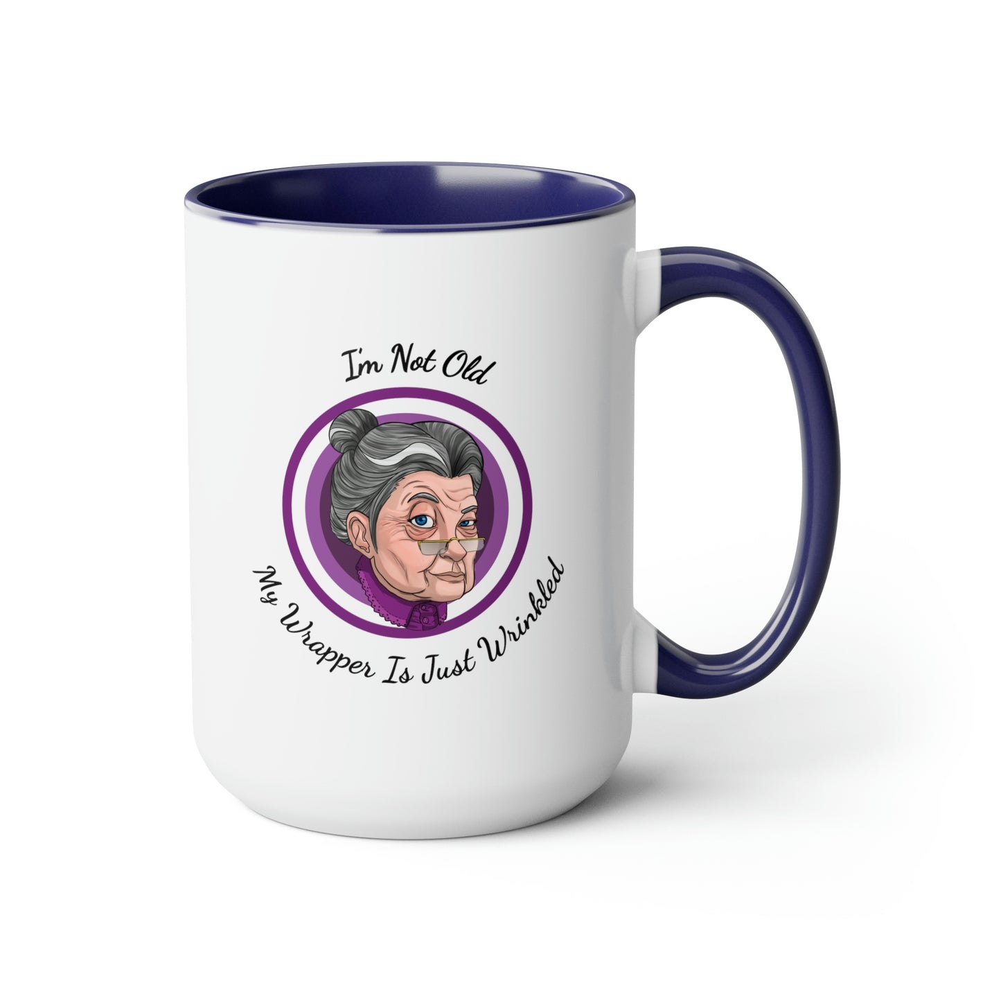 dark blue two tone coffee mug with purple logo saying I'm not old my wrapper is just wrinkled