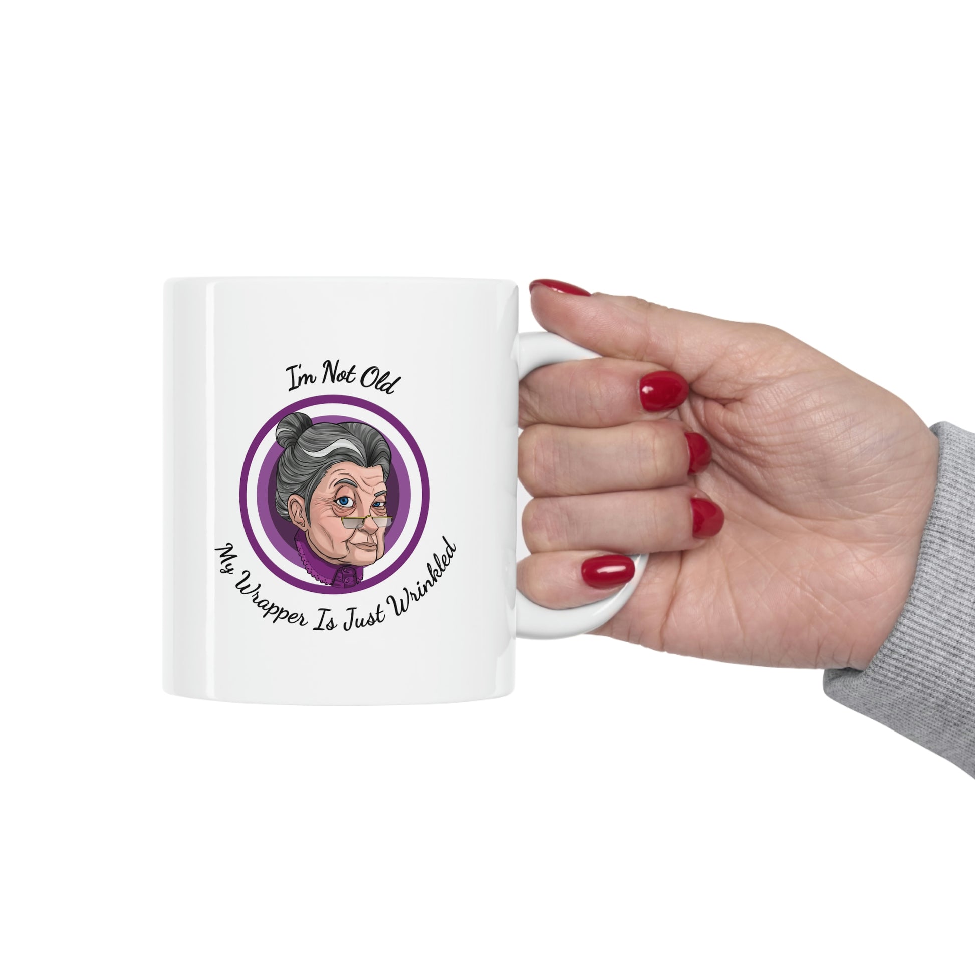 white 11oz mug with purple graphic saying i'm not old my wrapper is just wrinkled